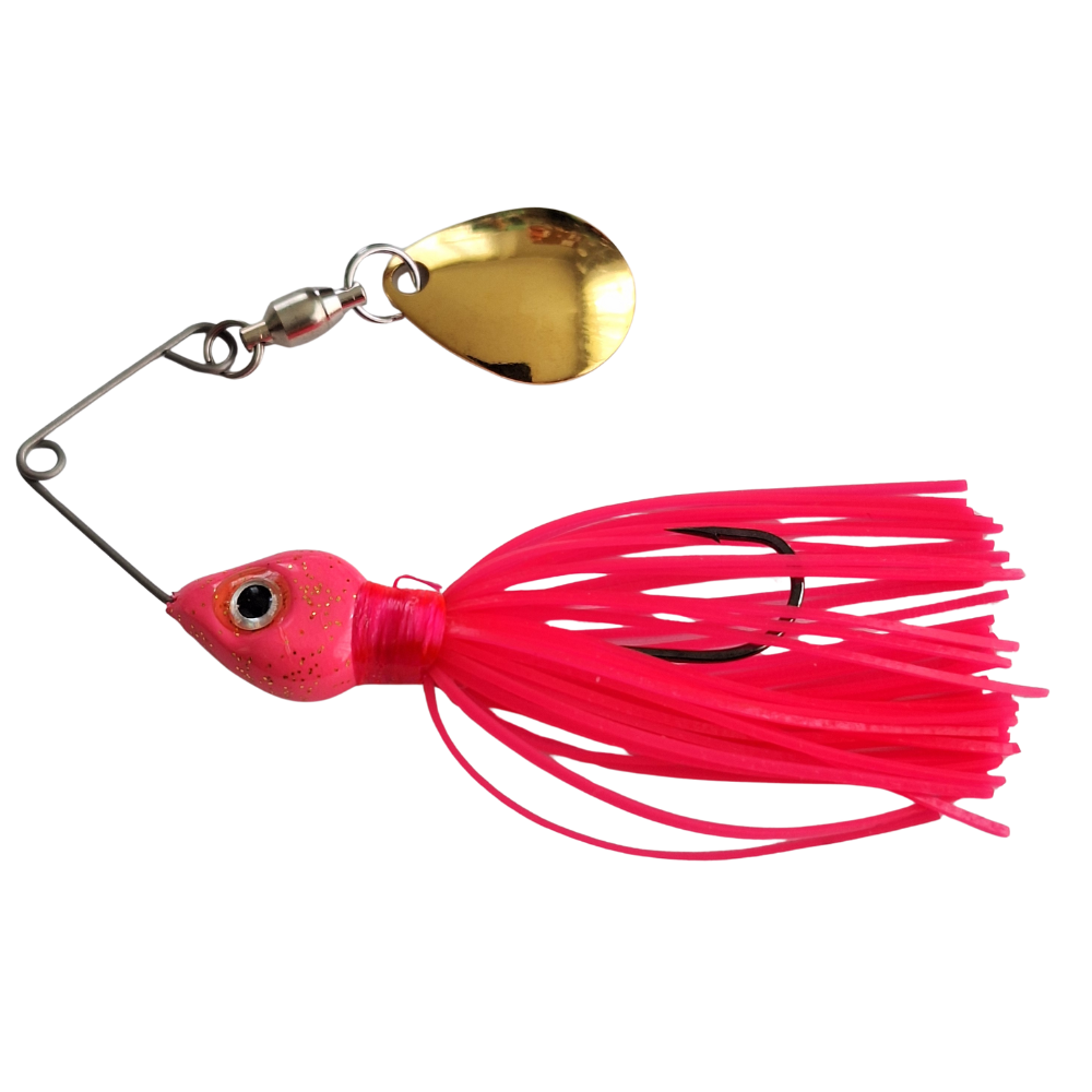 Pink fishing lure with a gold blade on a white background